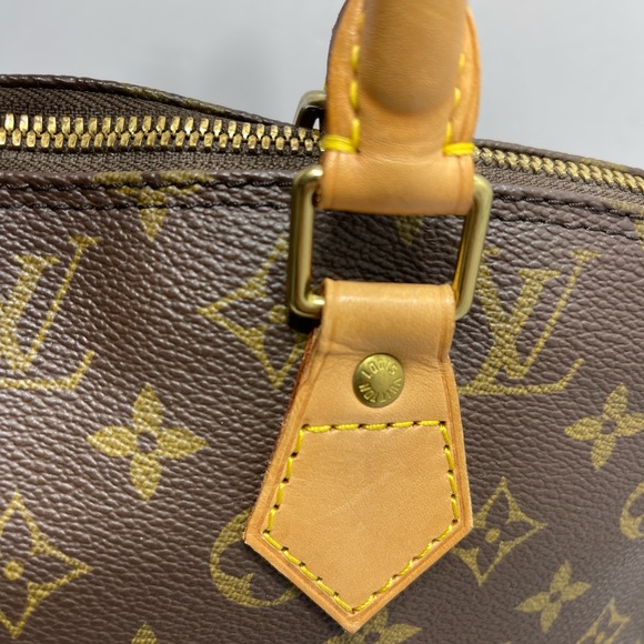 Loui Vuitton Alma in Monogram, with dust bag. - Picture 11 of 16